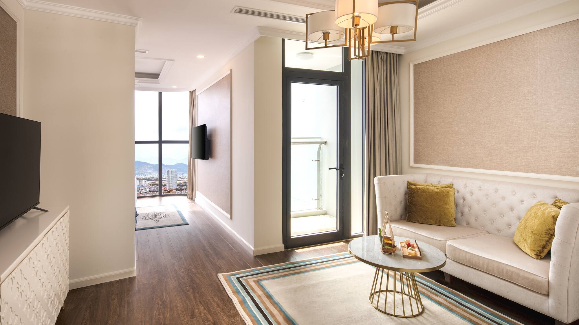 a living room with a couch and a rug