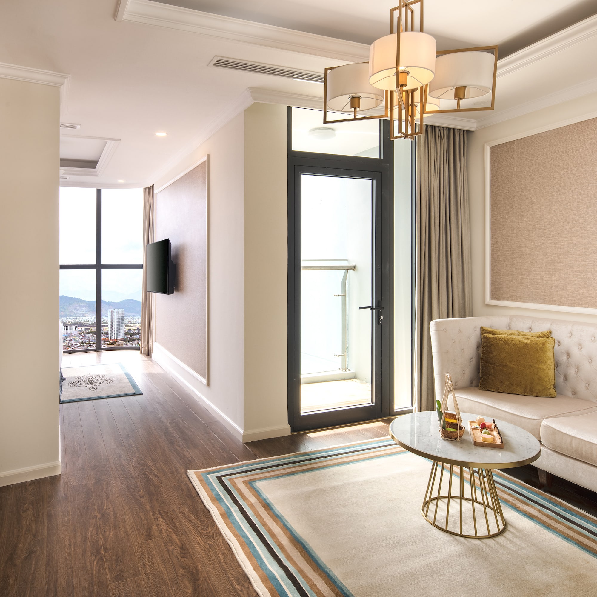 a living room with a couch and a rug