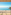 Benidorm beach from hotel balcony: sunny sea, sand, palm trees, distant island.