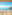 Benidorm beach from hotel balcony: sunny sea, sand, palm trees, distant island.