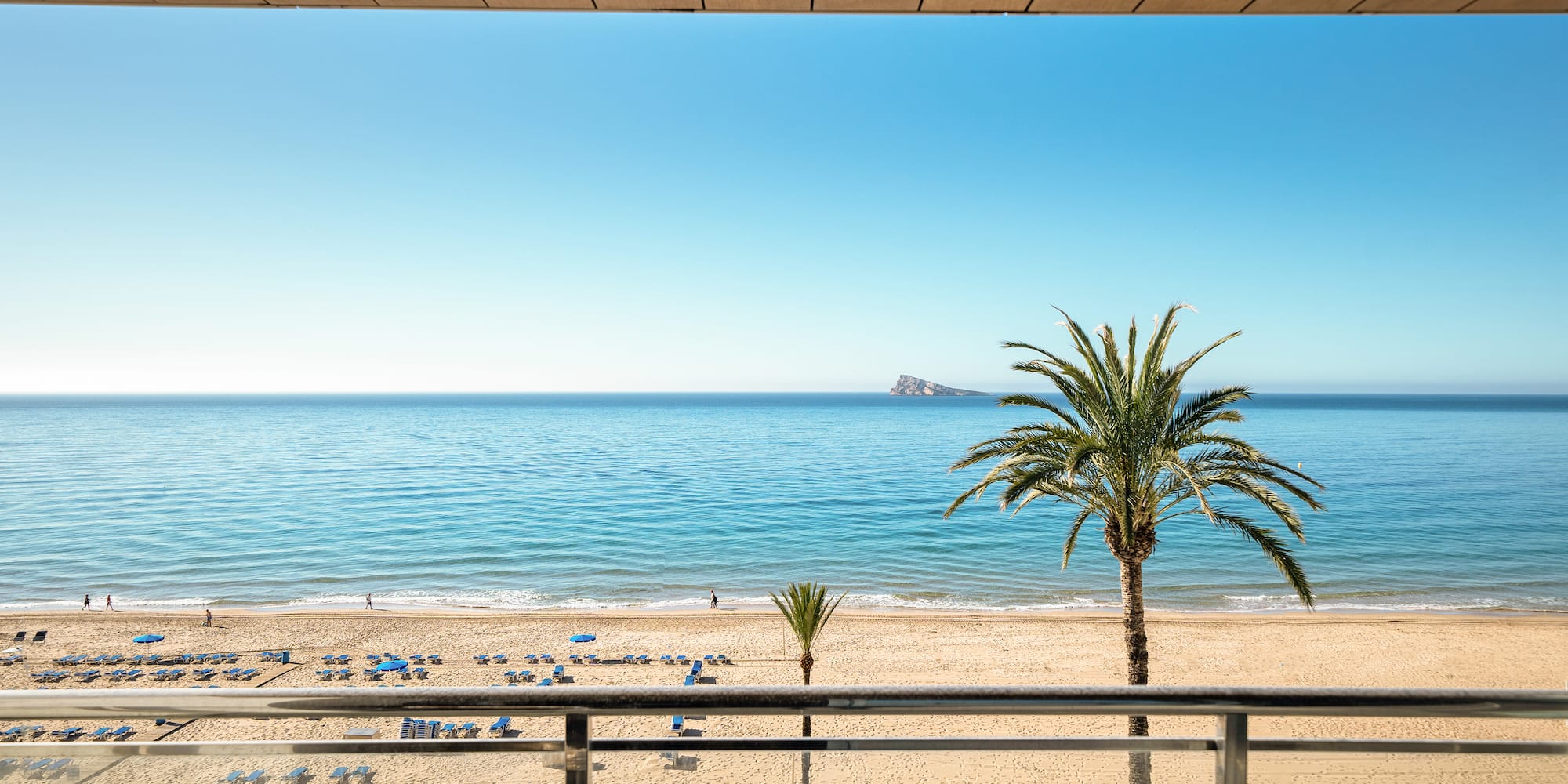 a view of a beach from a balcony