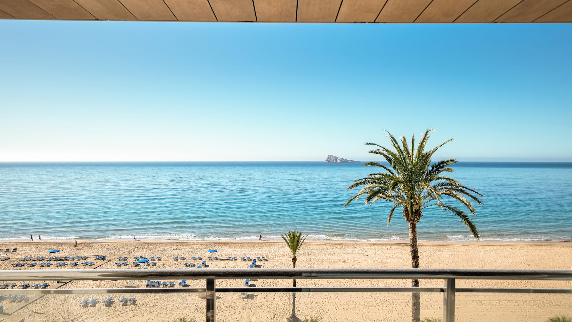 a view of a beach from a balcony
