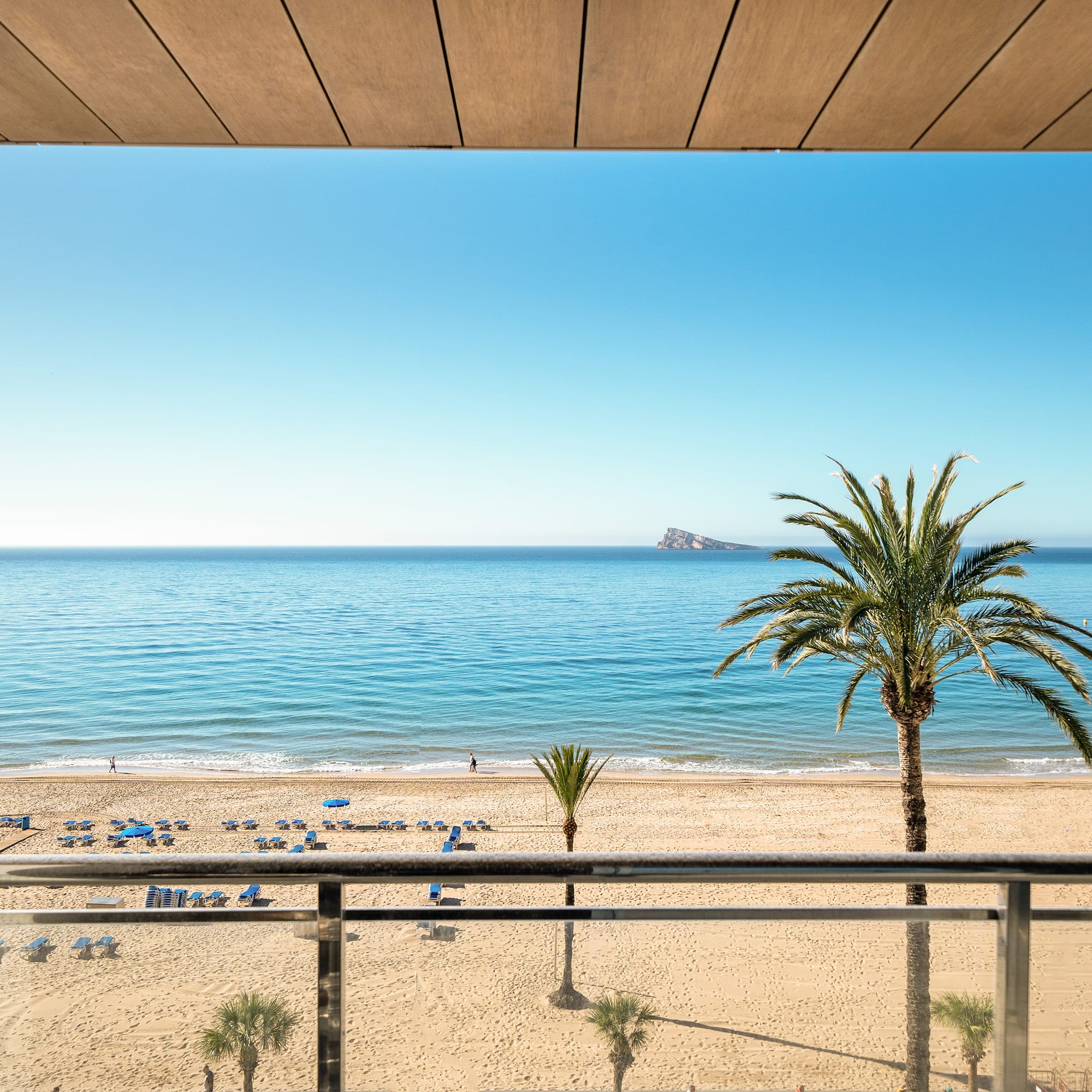 a view of a beach from a balcony