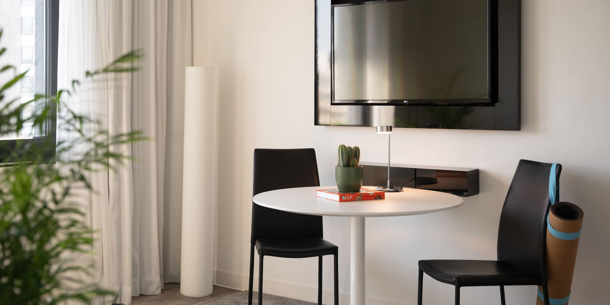 a table and chairs in a room