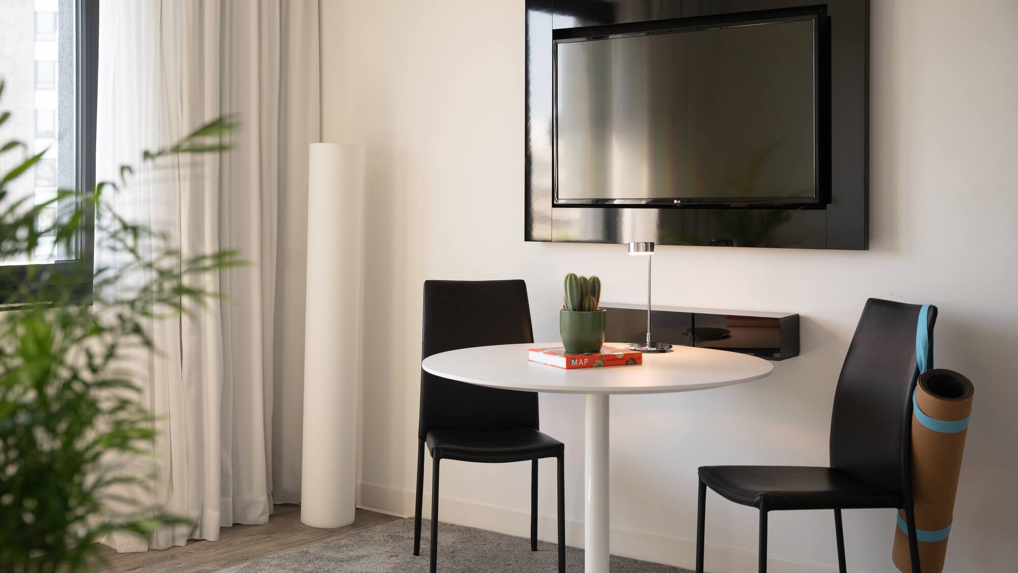 a table and chairs in a room