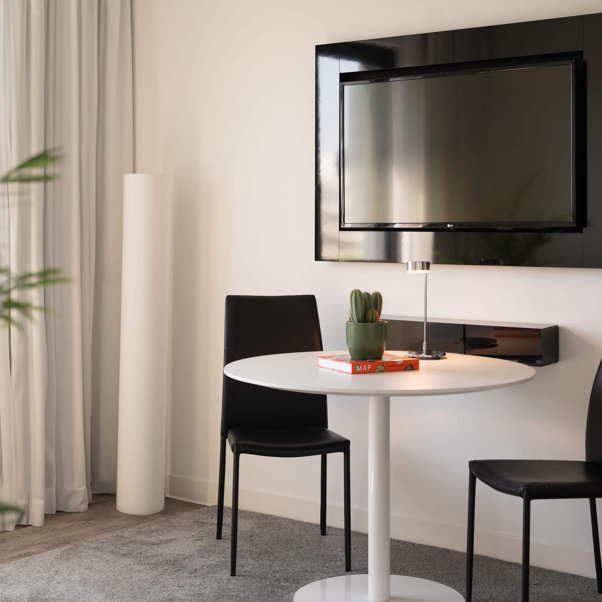 a table and chairs in a room