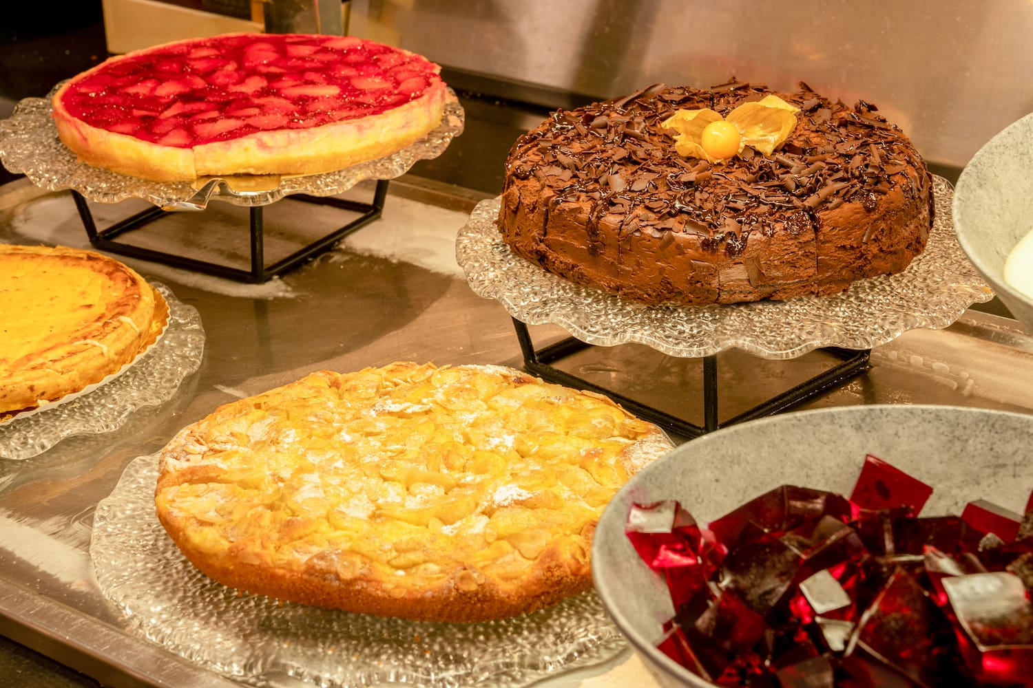 a group of cakes on plates