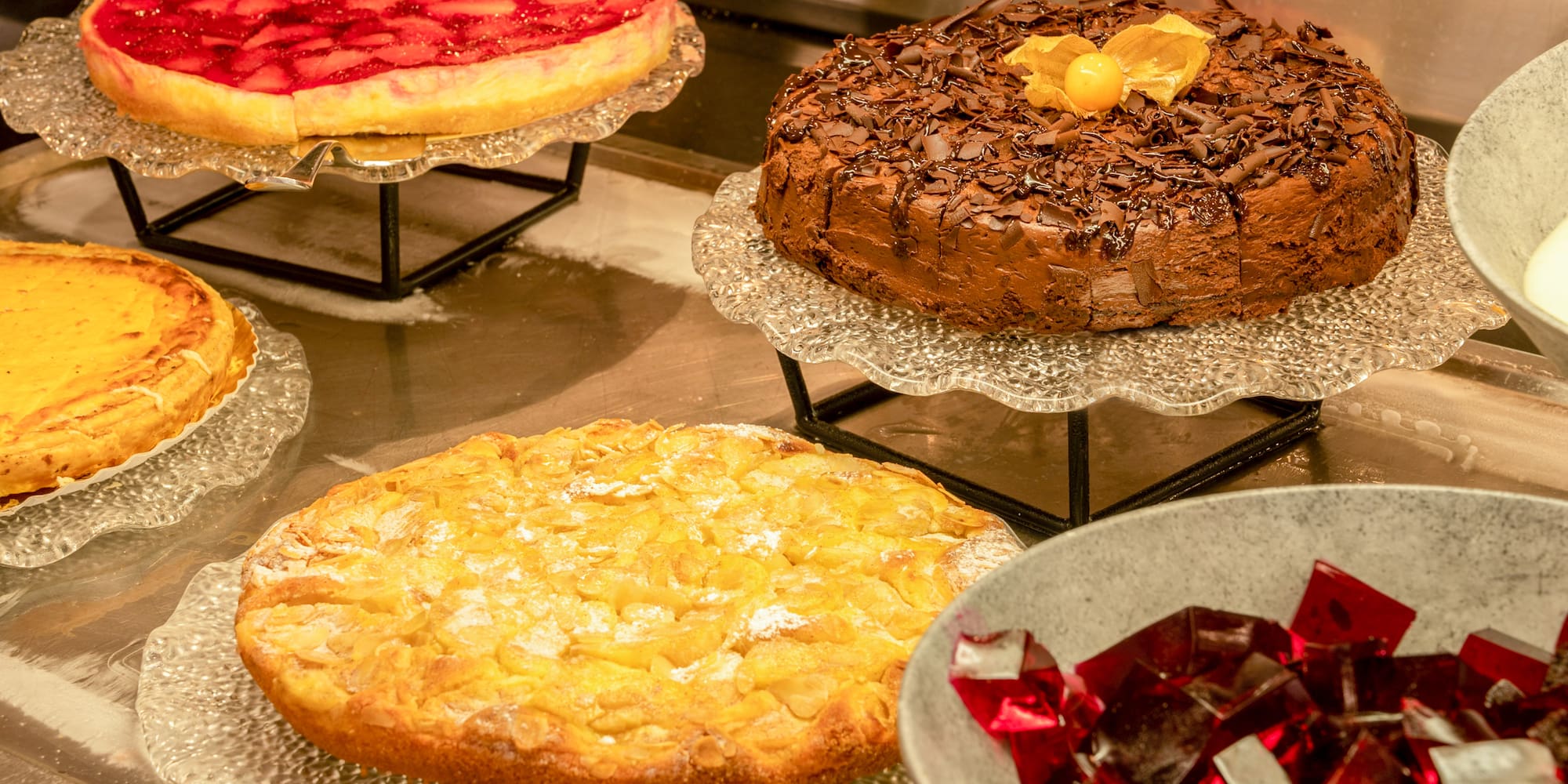 a group of cakes on plates