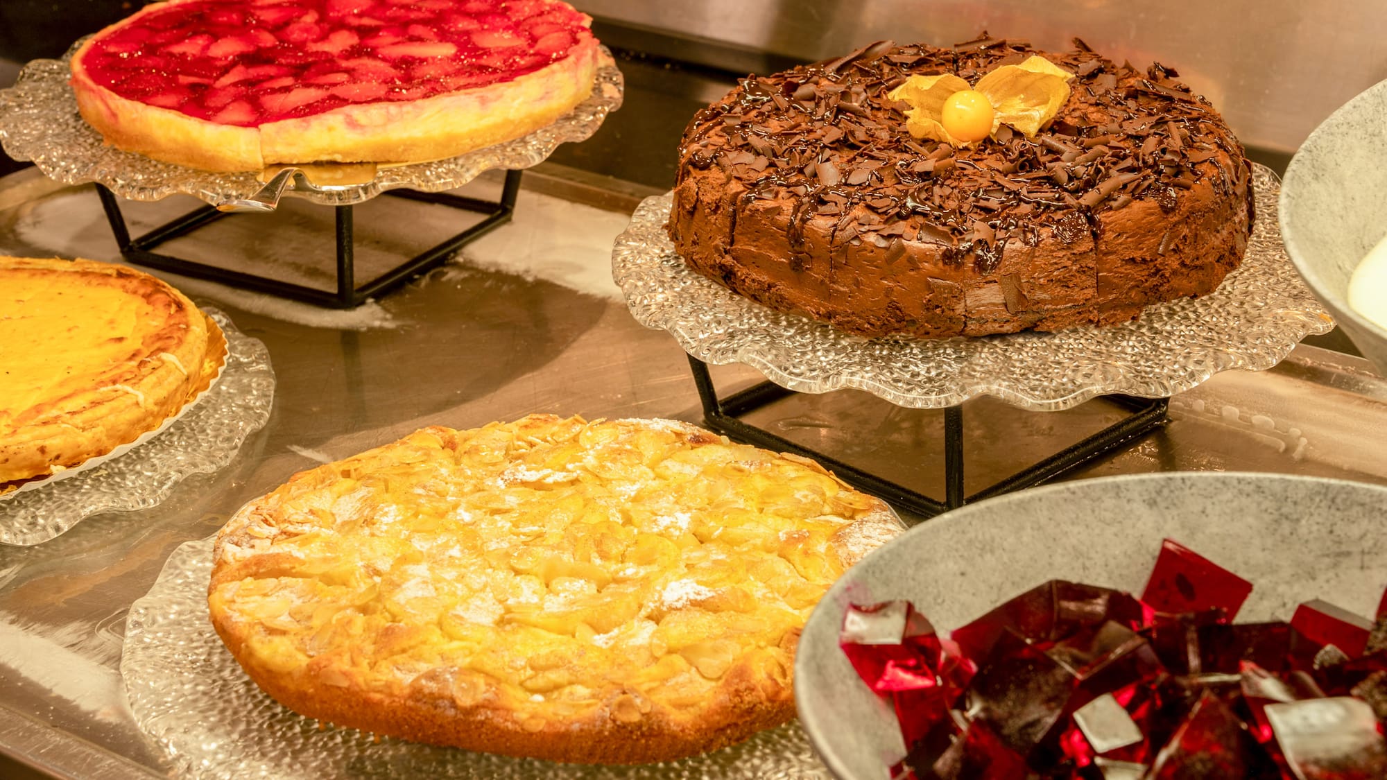 a group of cakes on plates