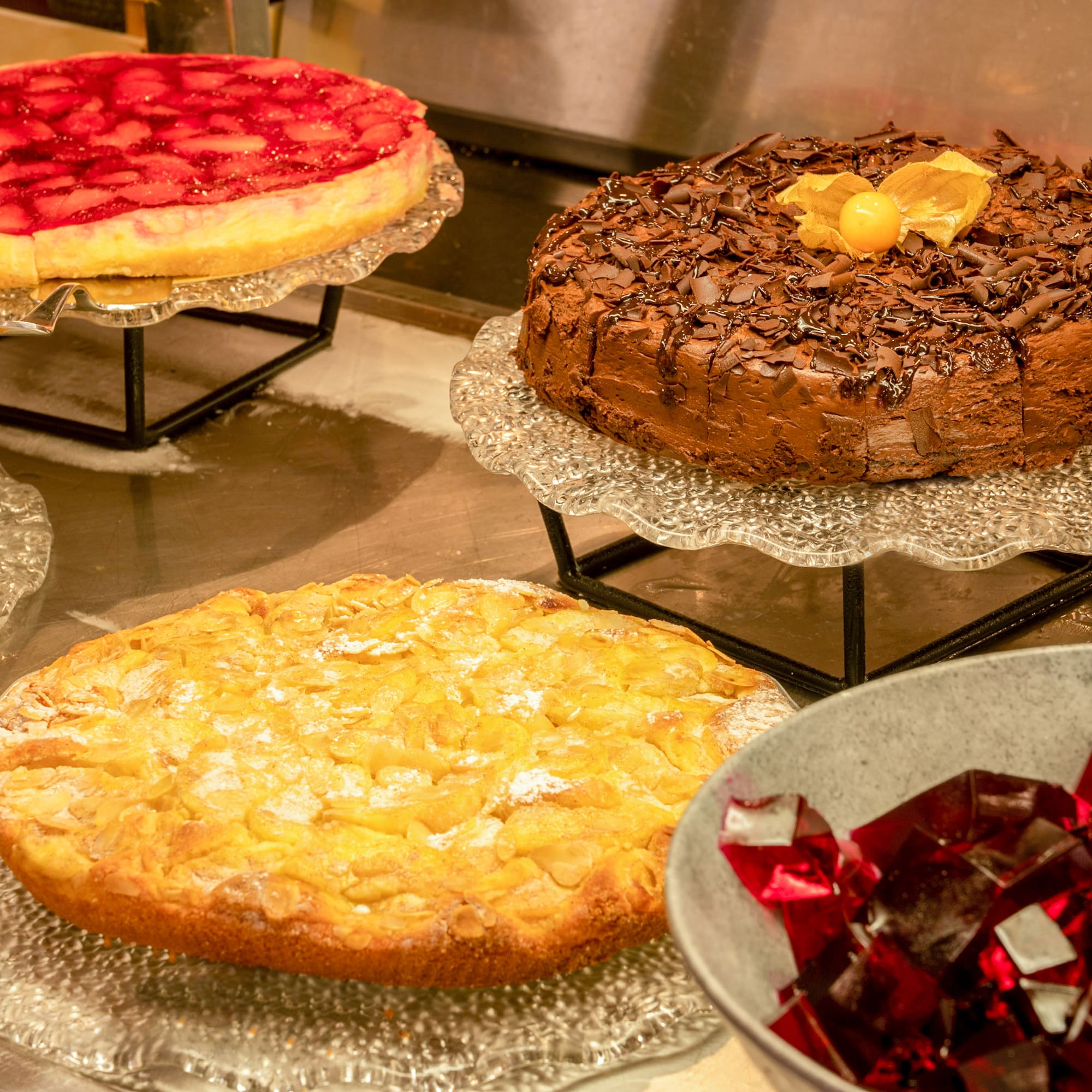 a group of cakes on plates
