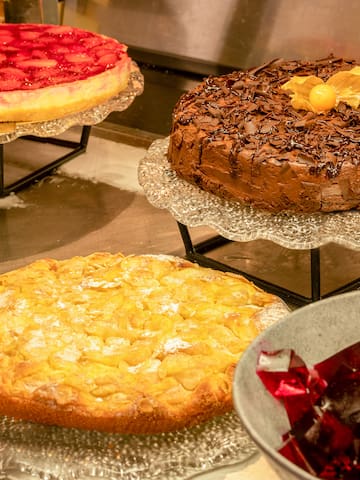 a group of cakes on plates
