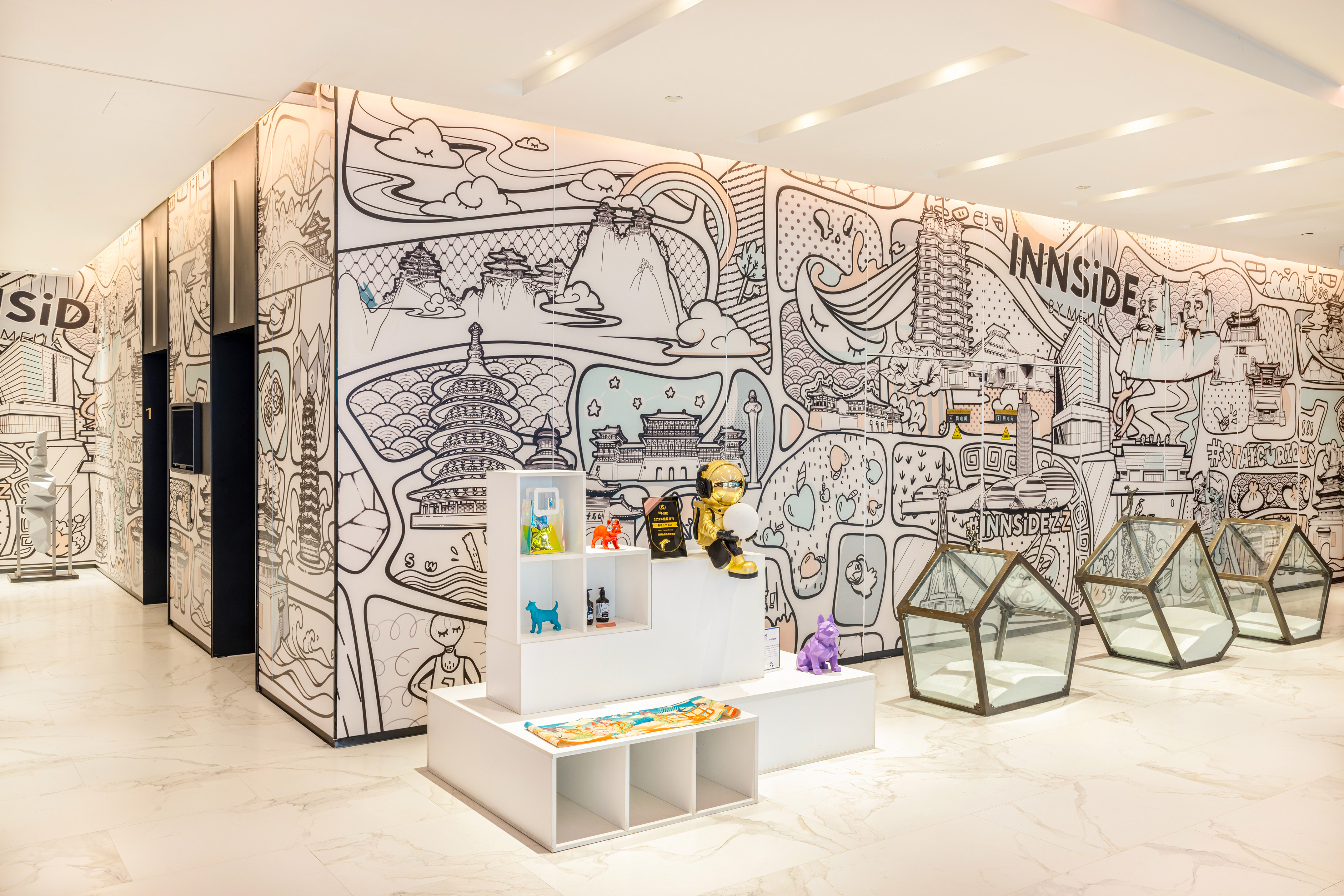 a room with a wall with a drawing of a cartoon character