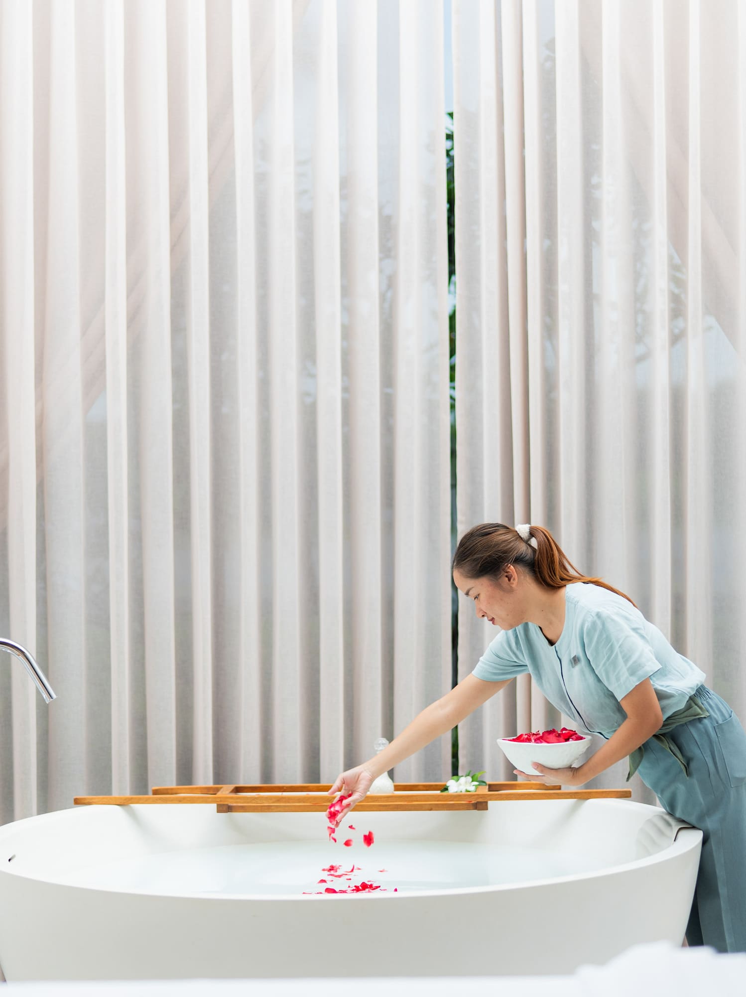 a woman in a bathtub