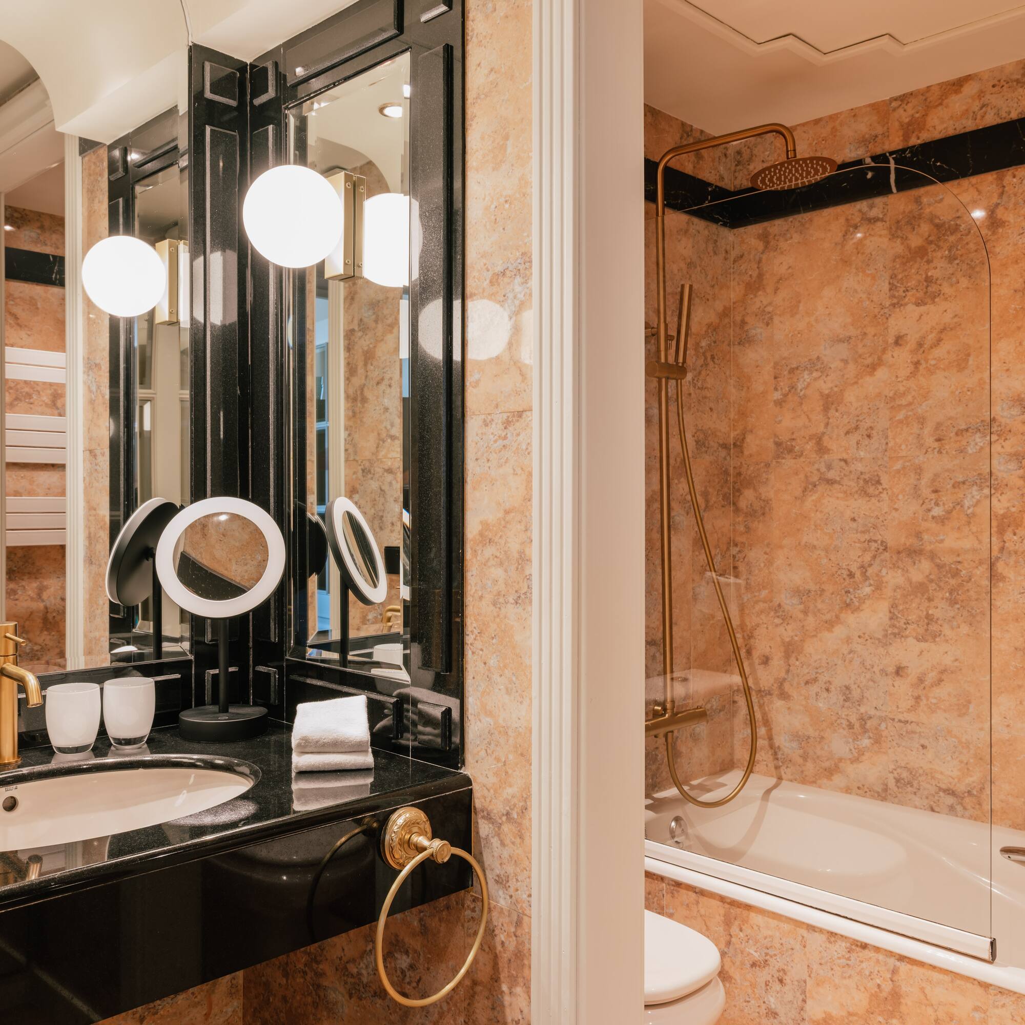 a bathroom with a sink and shower