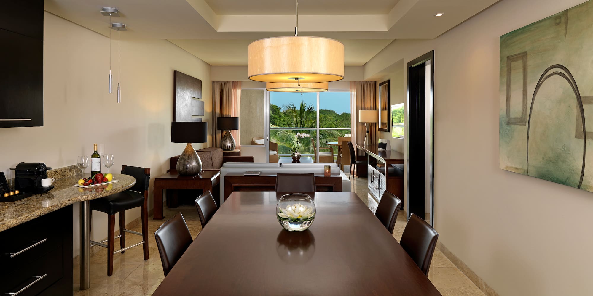 a dining room with a table and chairs