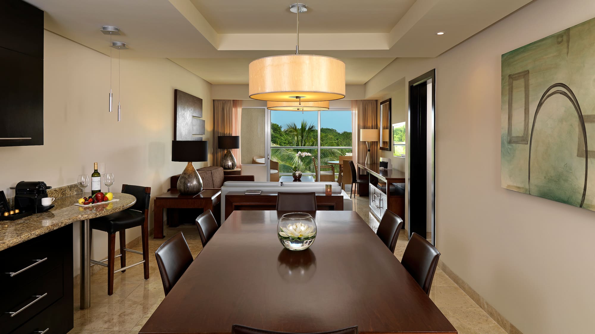 a dining room with a table and chairs