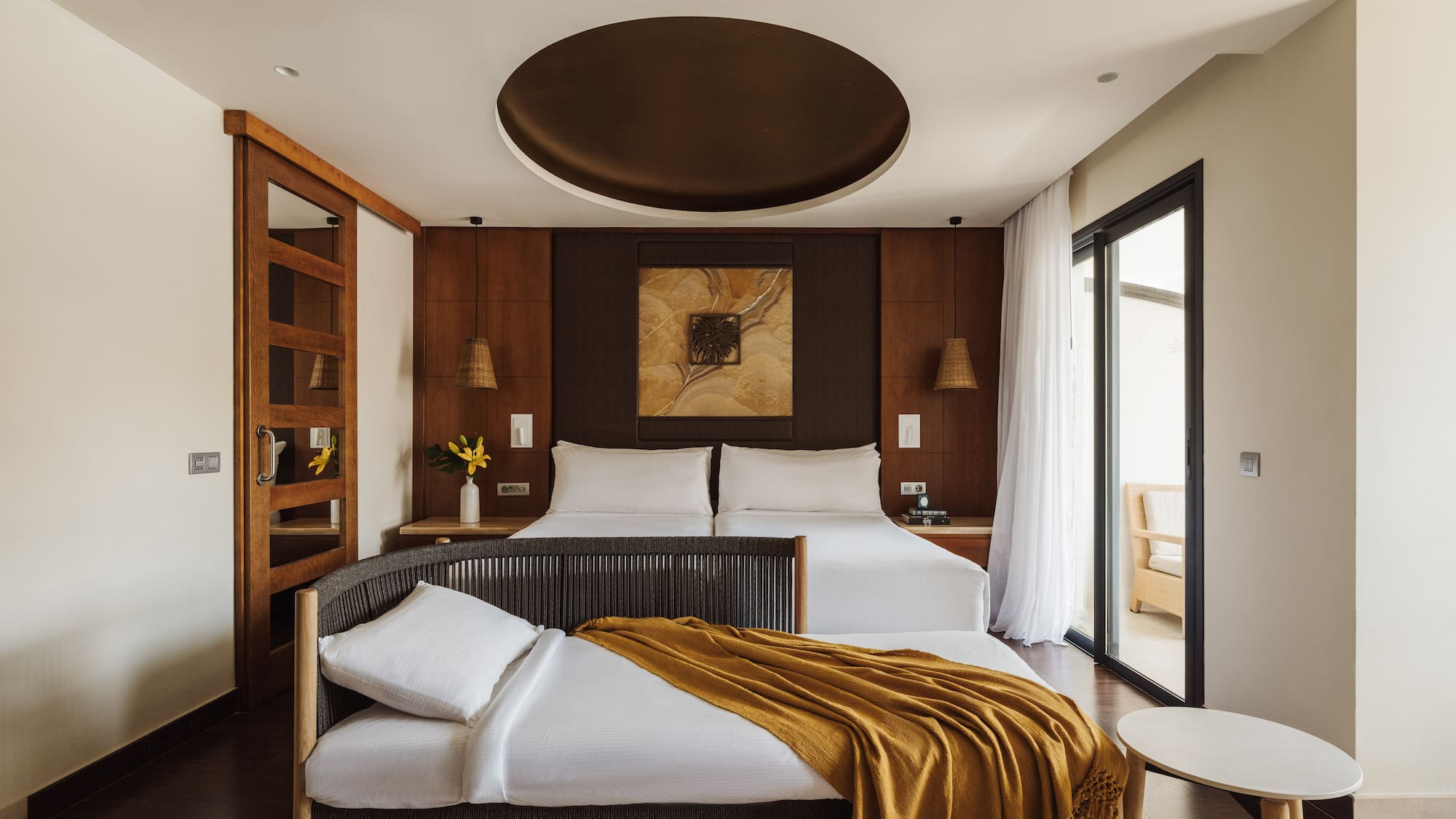 a bedroom with a bed and a table