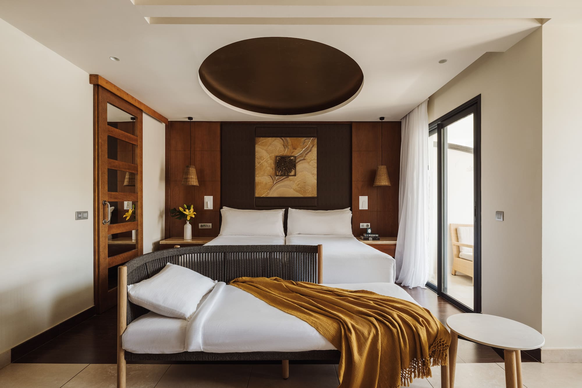 a bedroom with a bed and a table