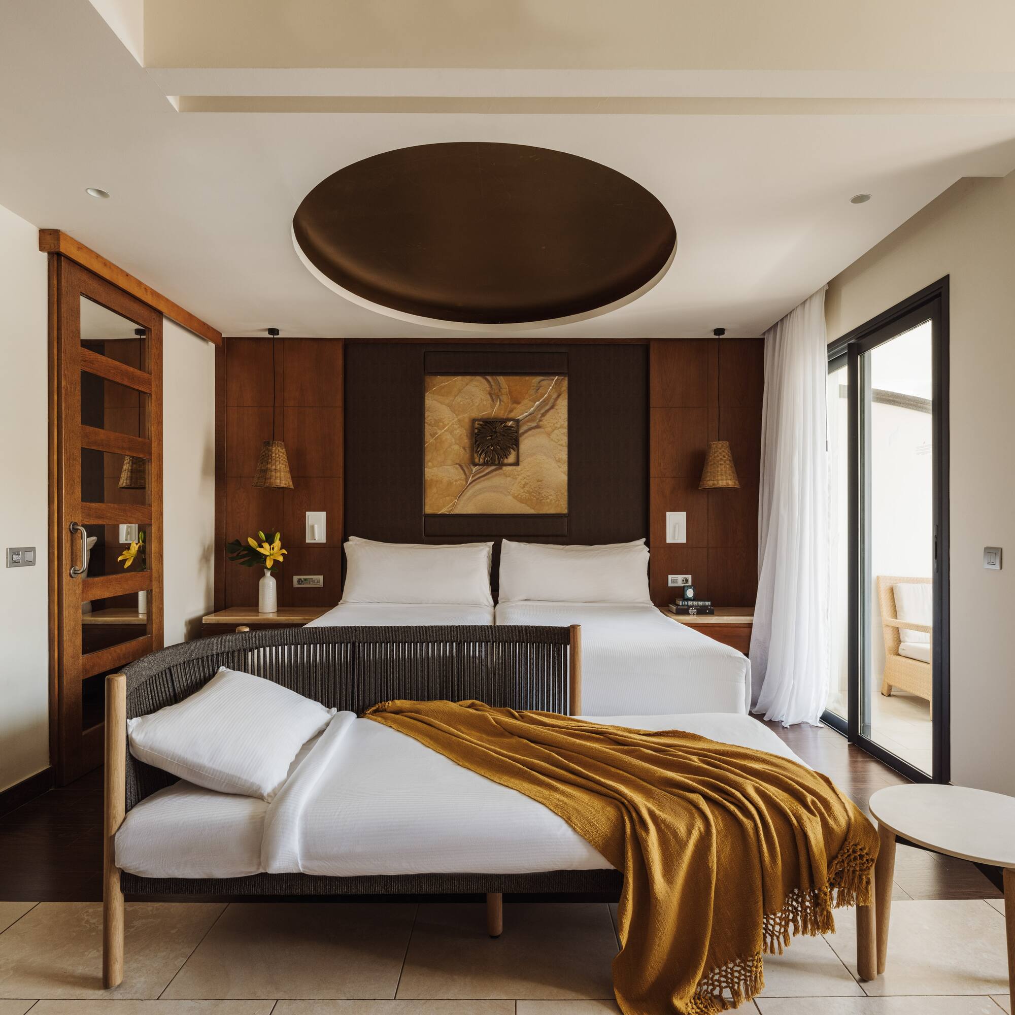 a bedroom with a bed and a table