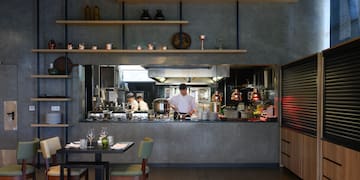 a chef cooking in a kitchen