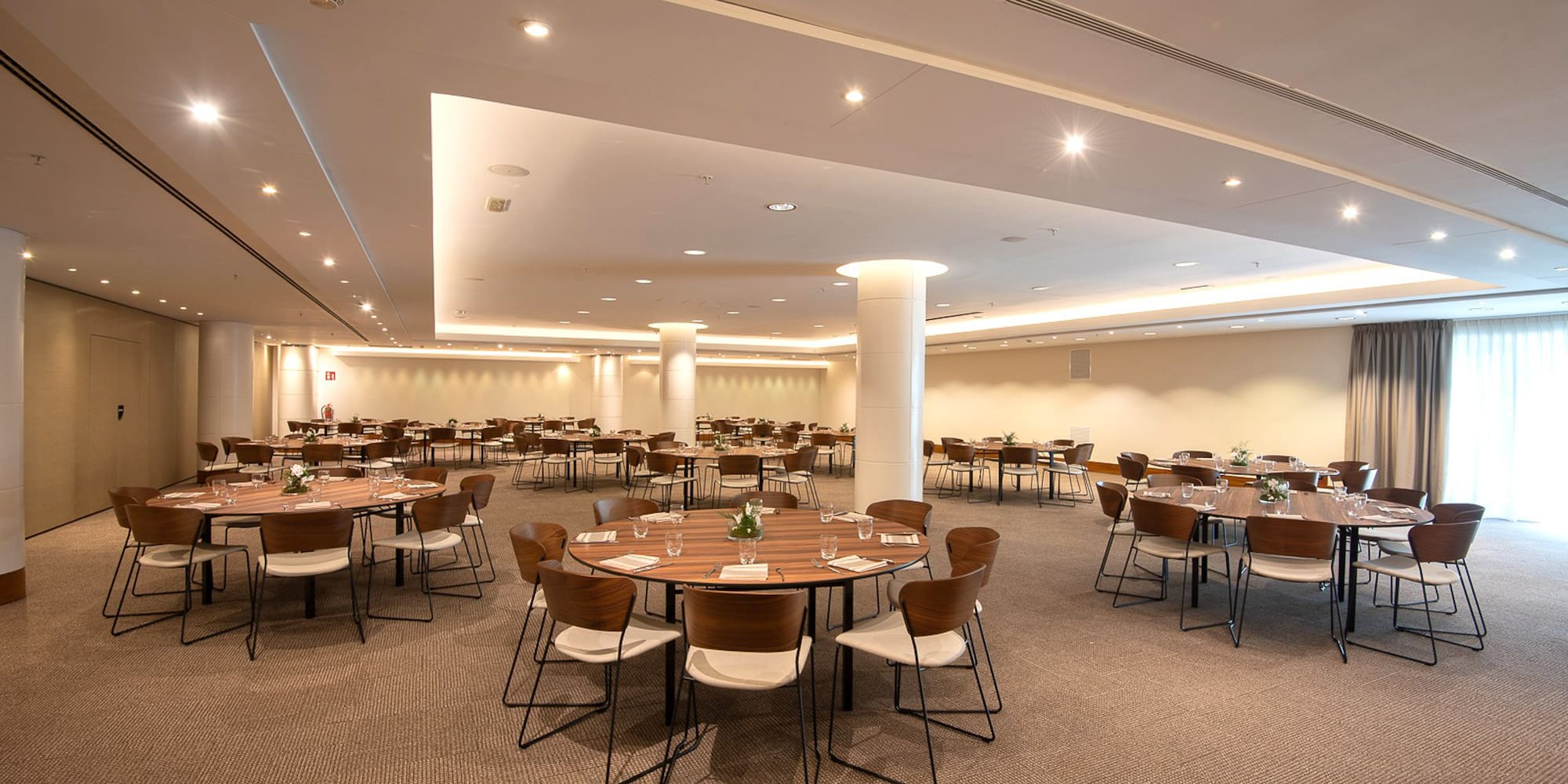 a room with tables and chairs