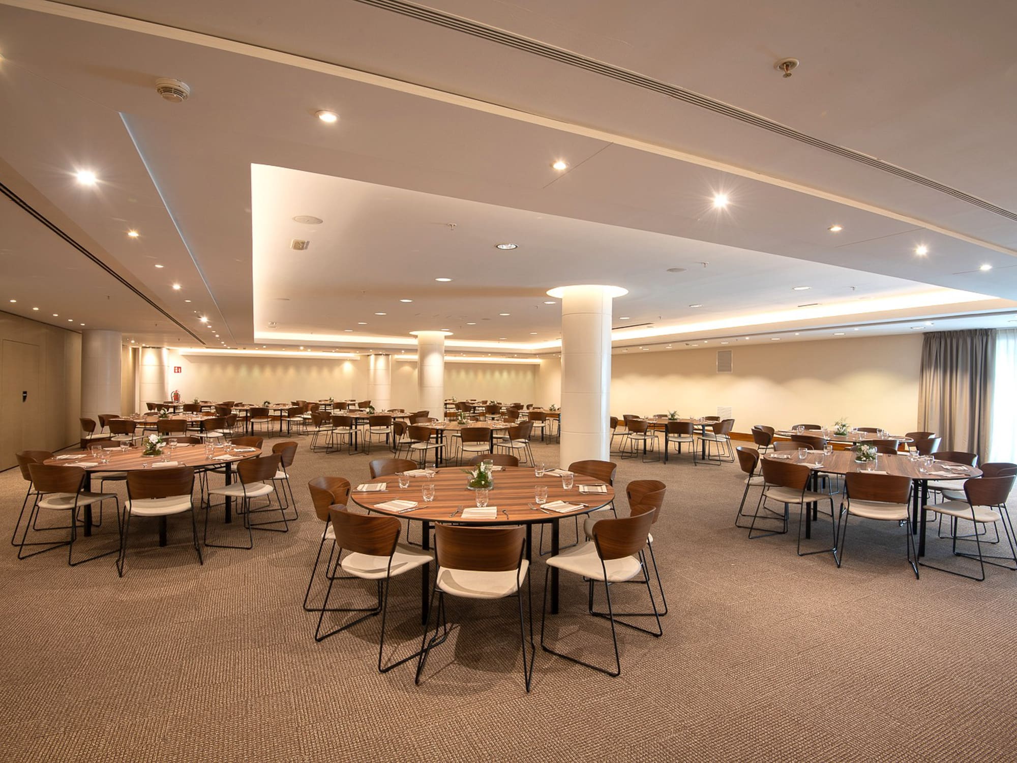 a room with tables and chairs