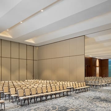 a large room with rows of chairs