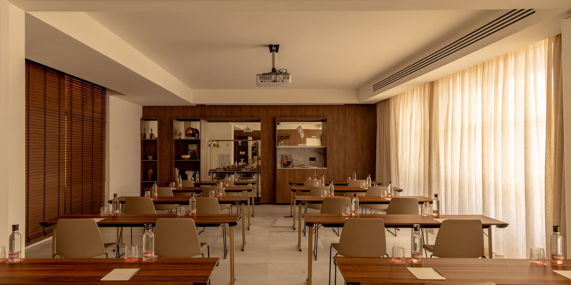 a room with tables and chairs