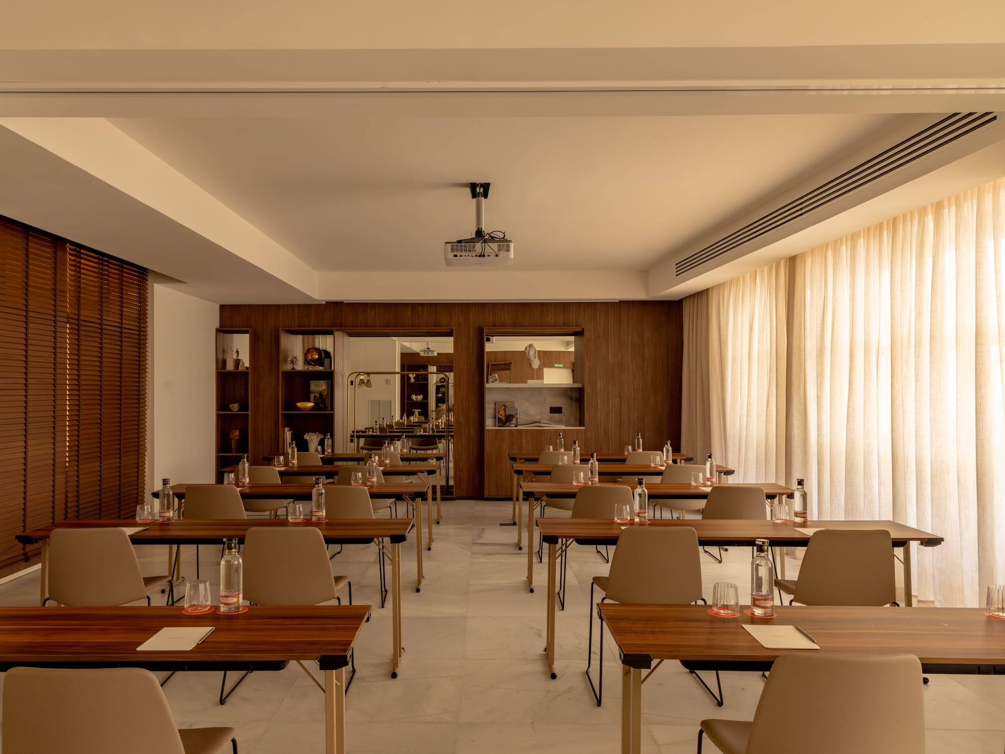 a room with tables and chairs