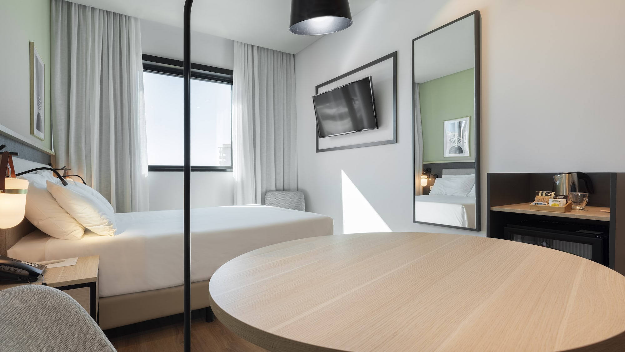 a room with a table and chairs