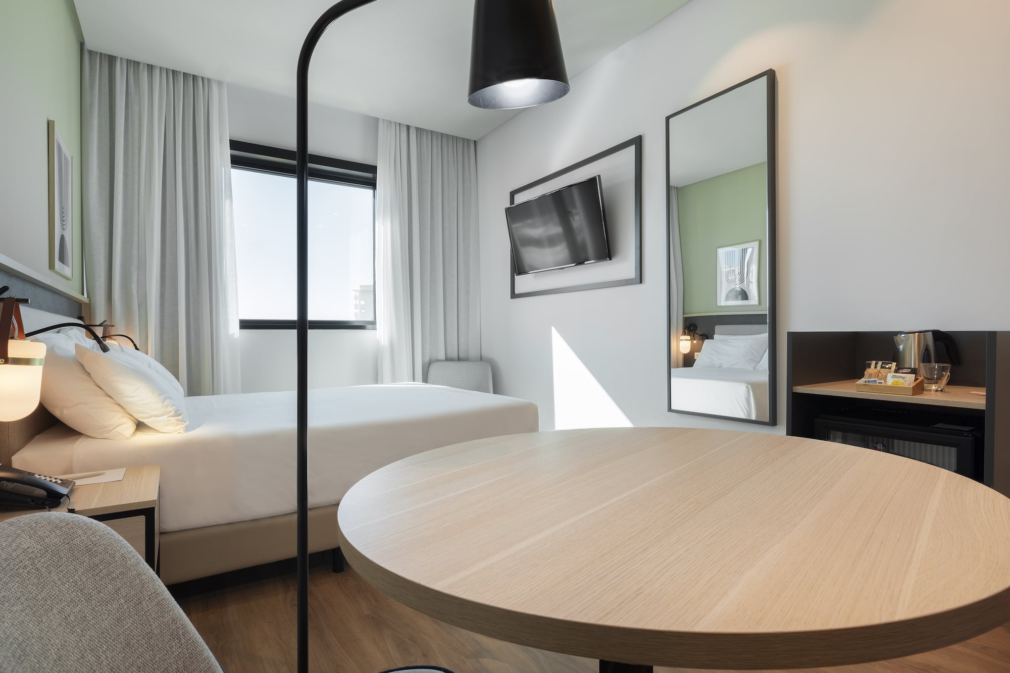 a room with a table and chairs