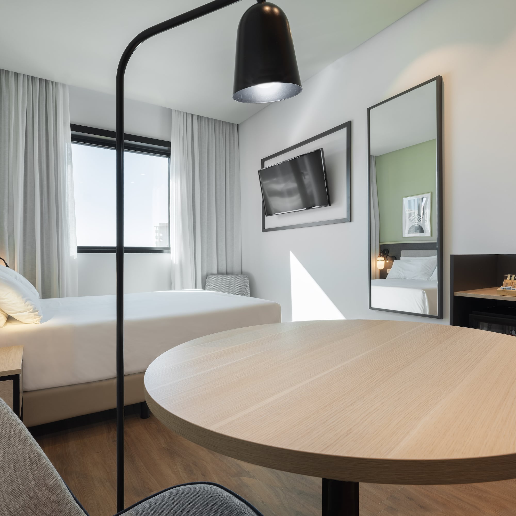 a room with a table and chairs