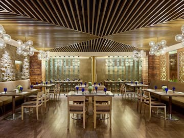 a restaurant with tables and chairs