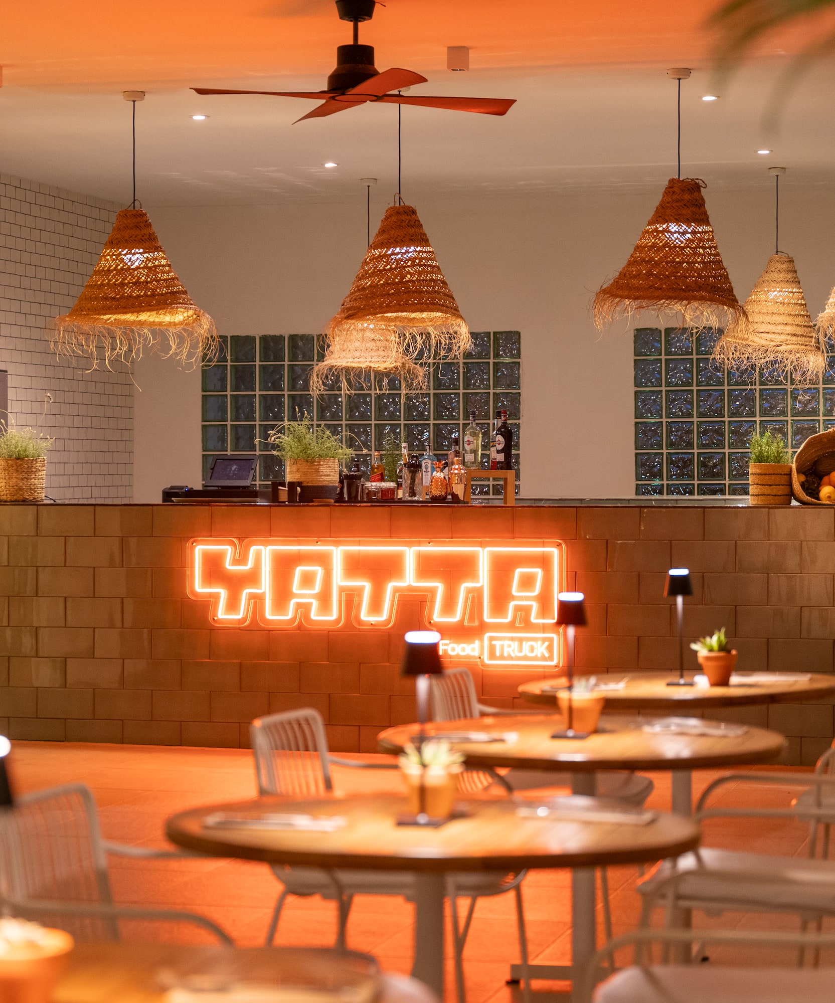 a room with tables and chairs