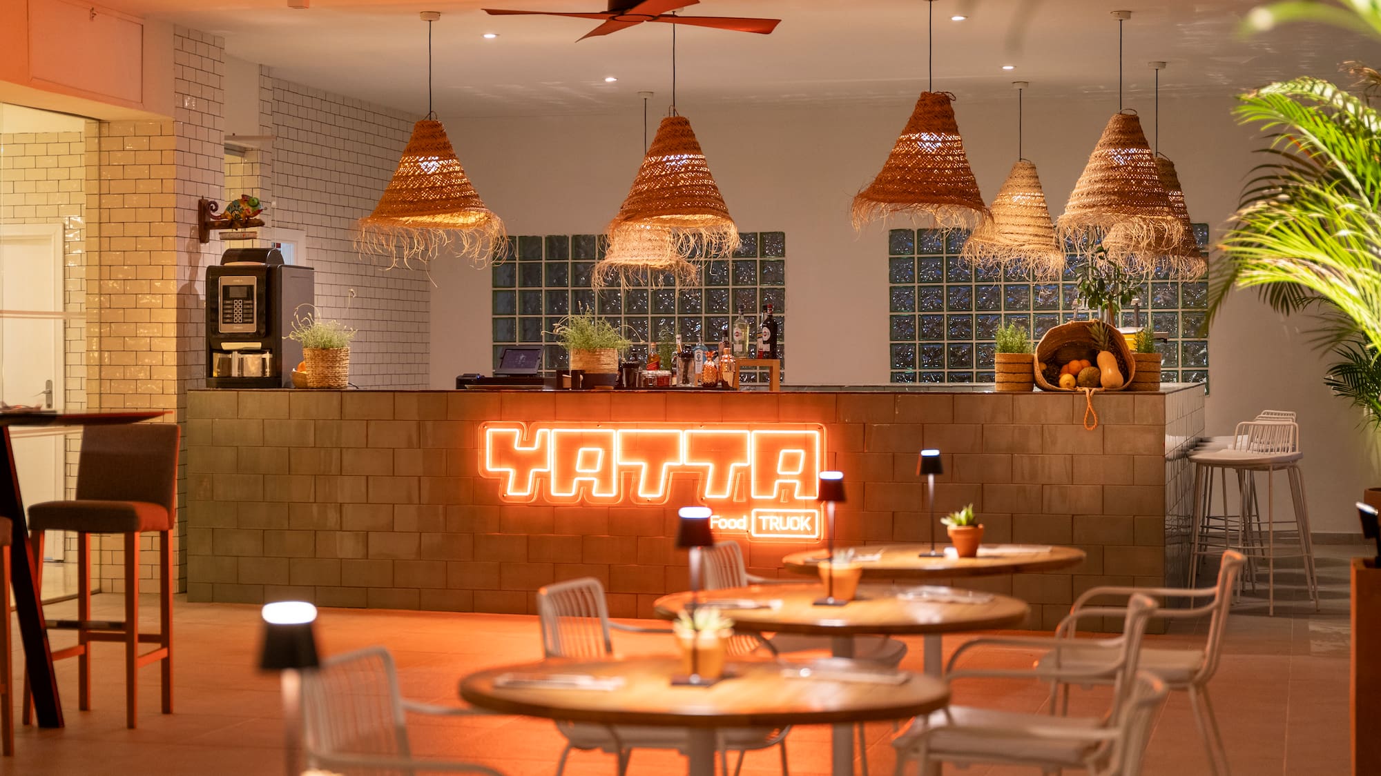 a room with tables and chairs