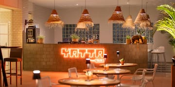 a room with tables and chairs