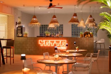 a room with tables and chairs