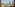 London skyline from a rooftop bar terrace, featuring The Shard and modern buildings.