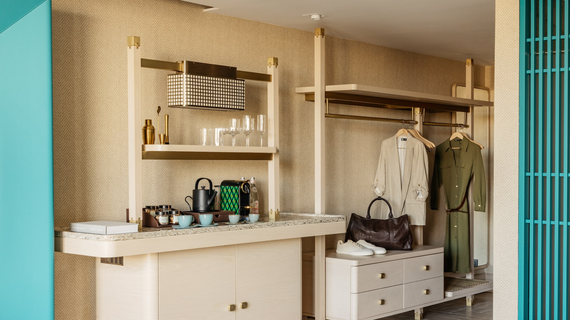 a room with a counter and shelves and a coat rack