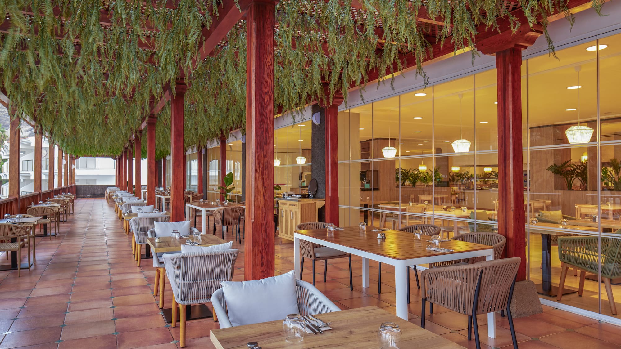 a restaurant with tables and chairs