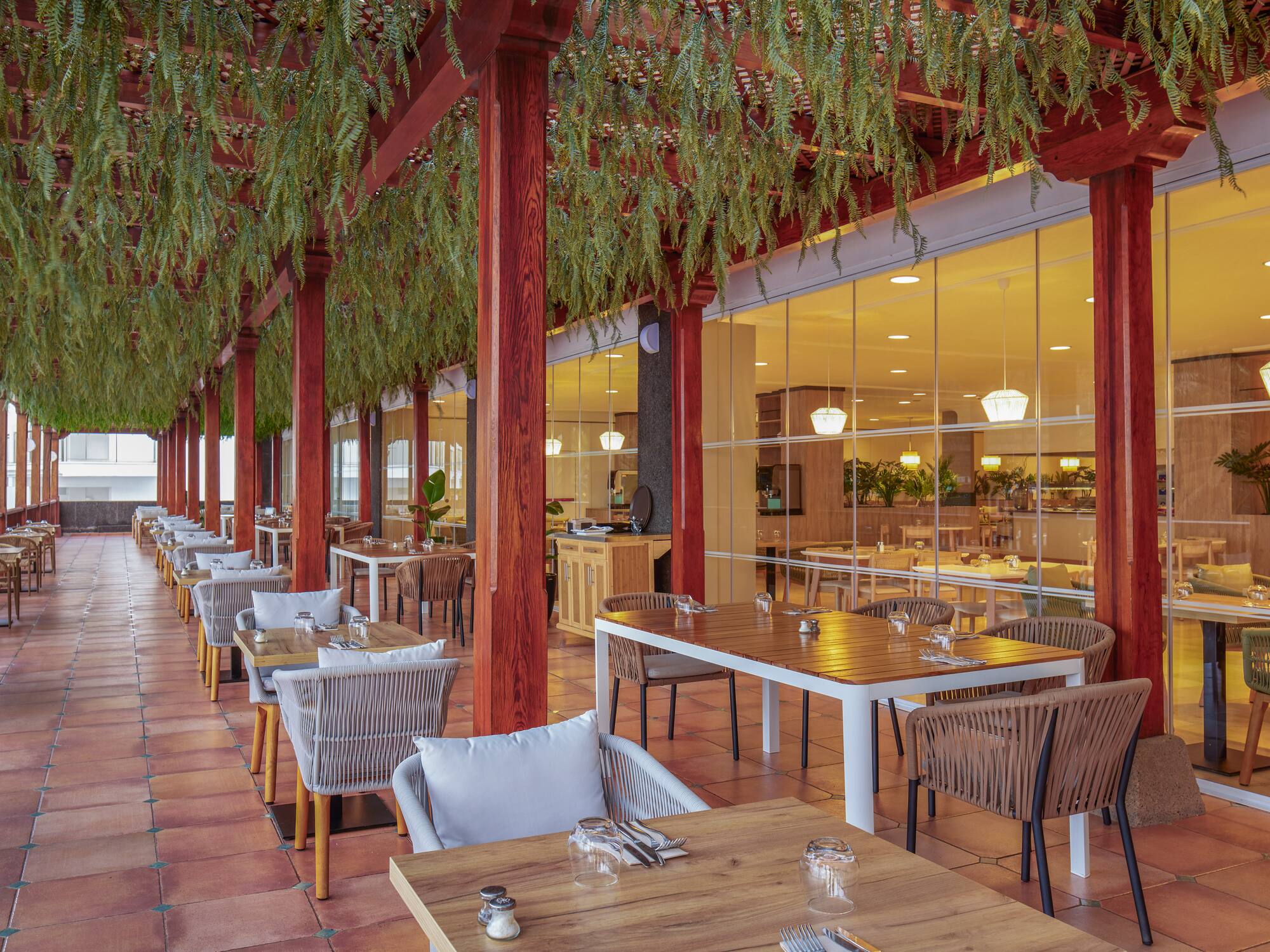 a restaurant with tables and chairs