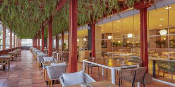 a restaurant with tables and chairs