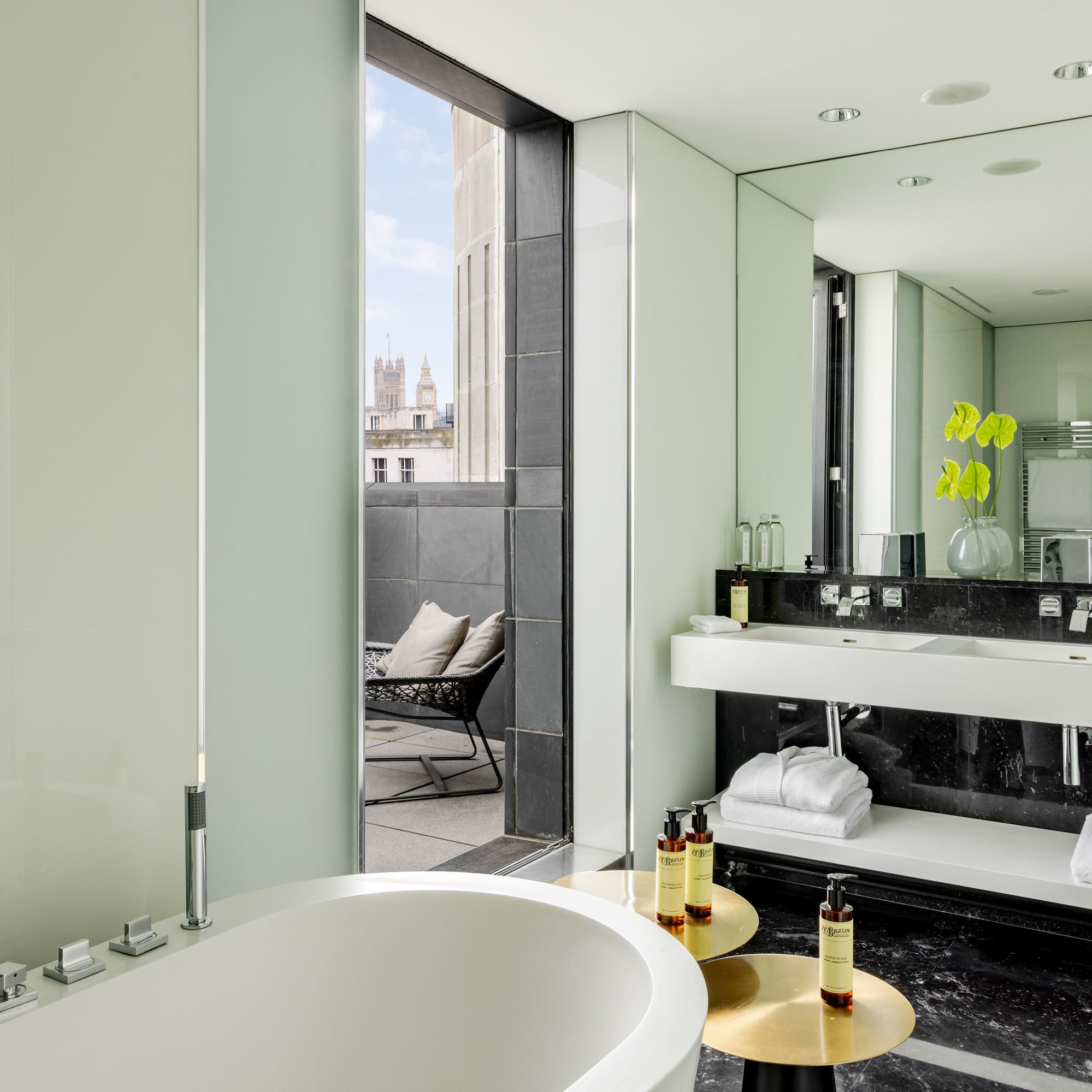 a bathroom with a tub and sink