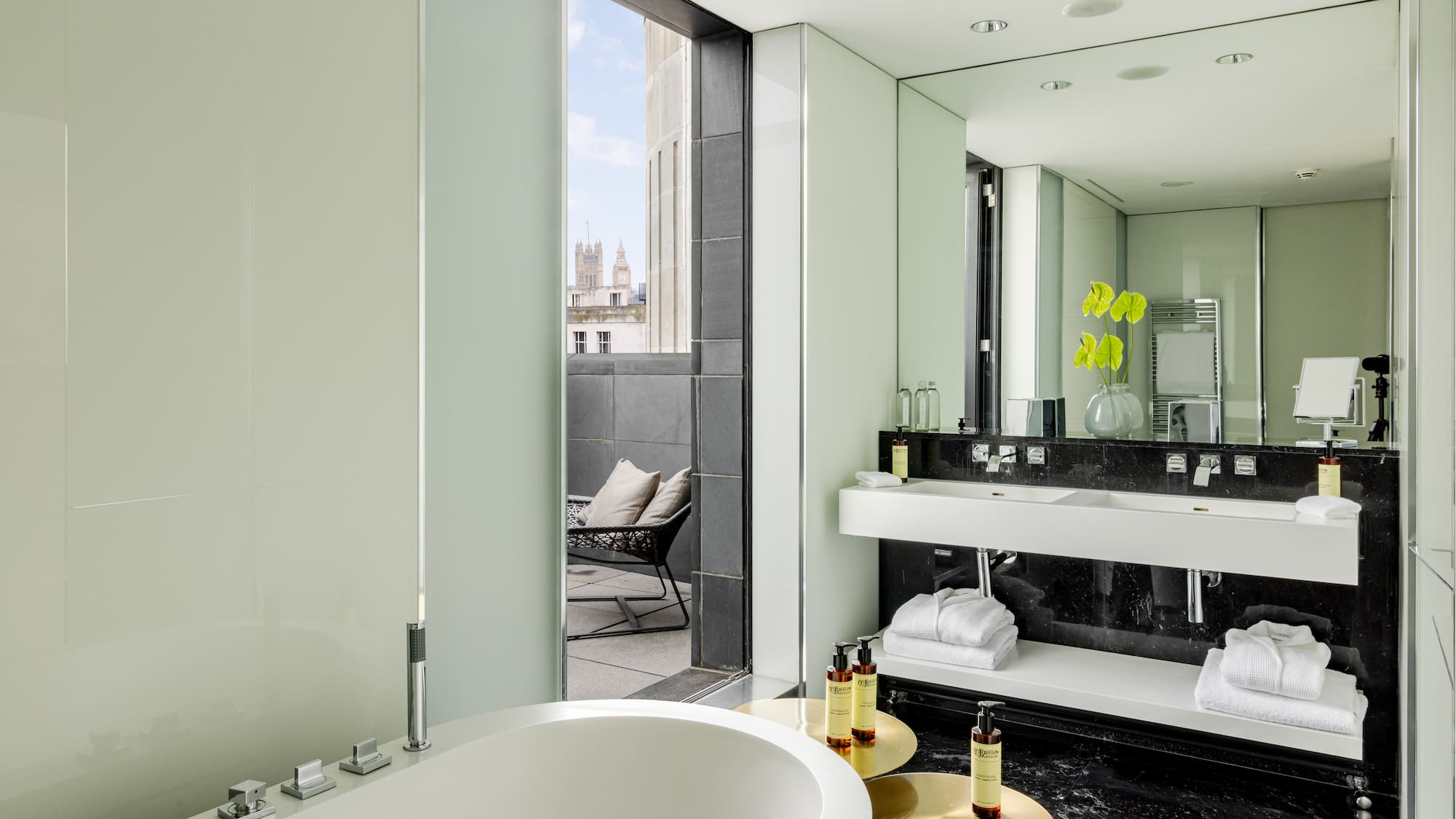 a bathroom with a tub and sink