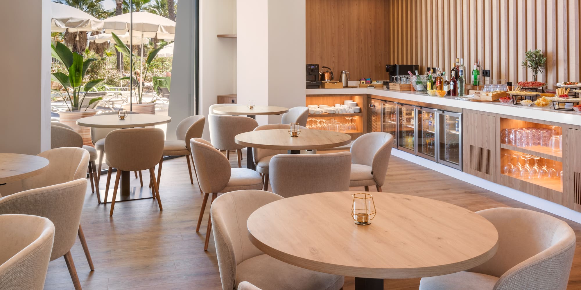 a room with a desk and chairs