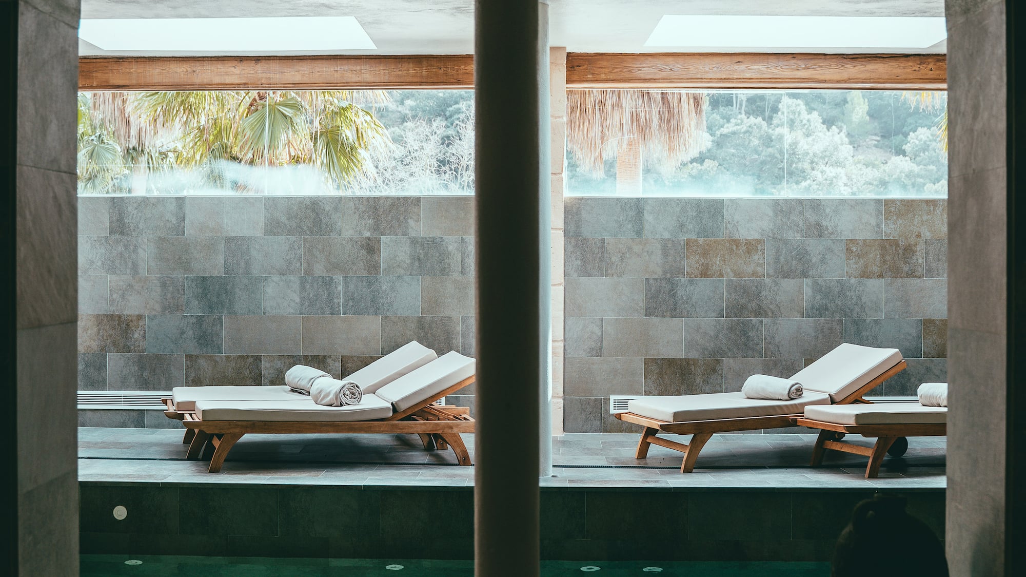 a pool with chairs in it