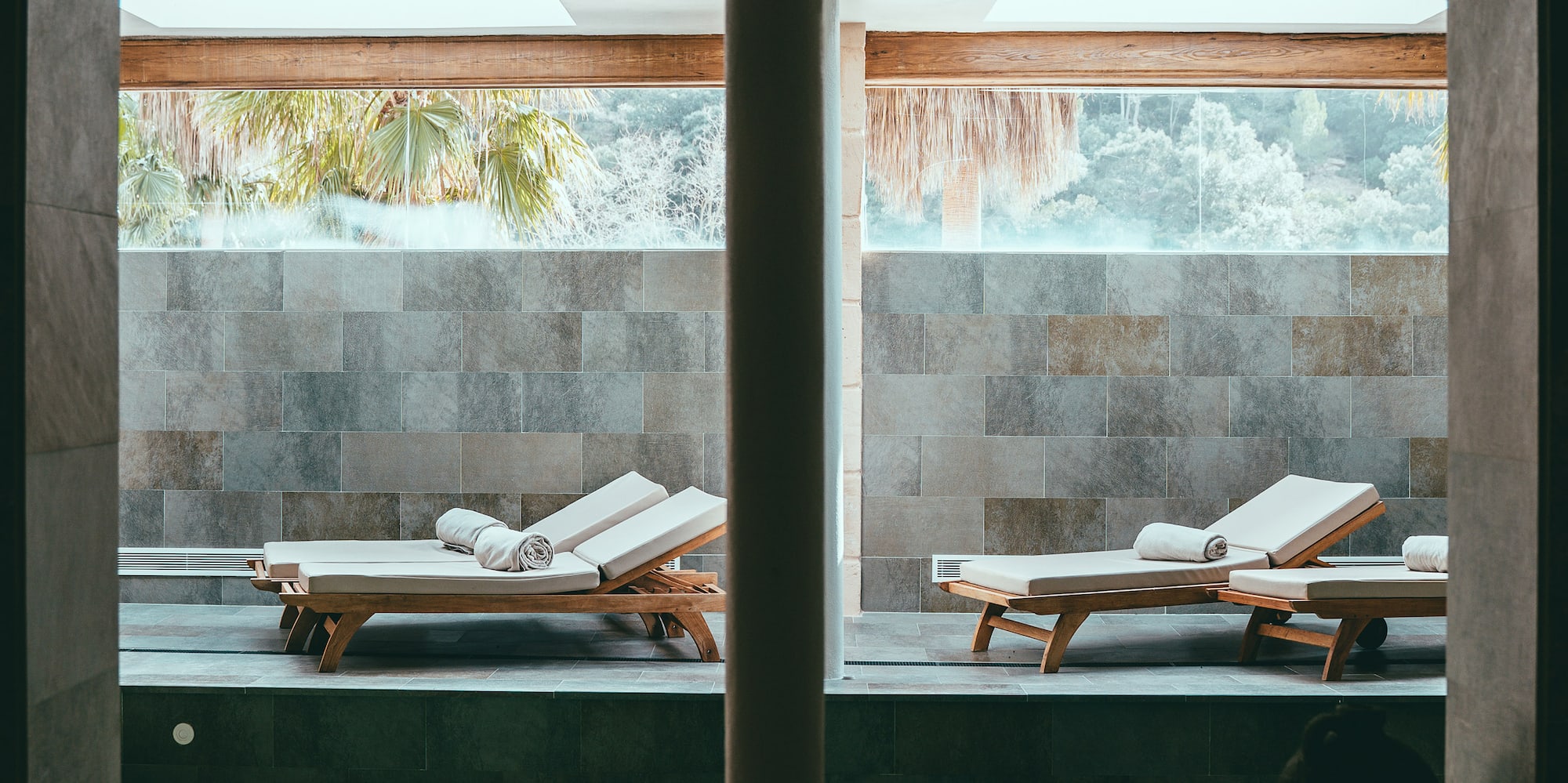 a pool with chairs in it