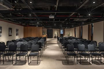 a room with rows of chairs