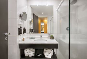 a bathroom with a mirror and sink