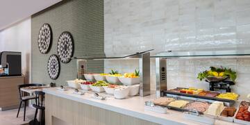 a buffet with food on the counter